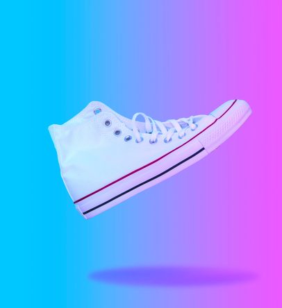 Flying in the air white sneaker.  Contemporary collage art. Abstract surrealism and minimalism